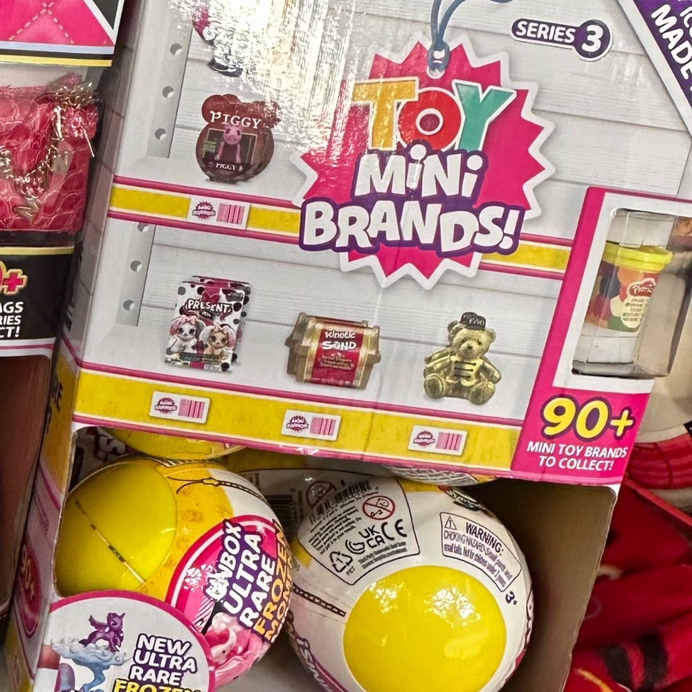 Vibrant Yellow and Pink Toys with Spherical Containers
